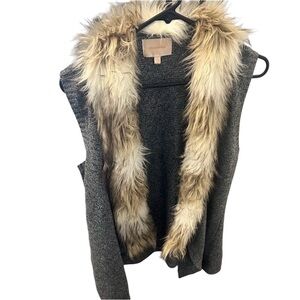 Skies are blue bean bc vest. Faux fur in front. Grey sweater vest